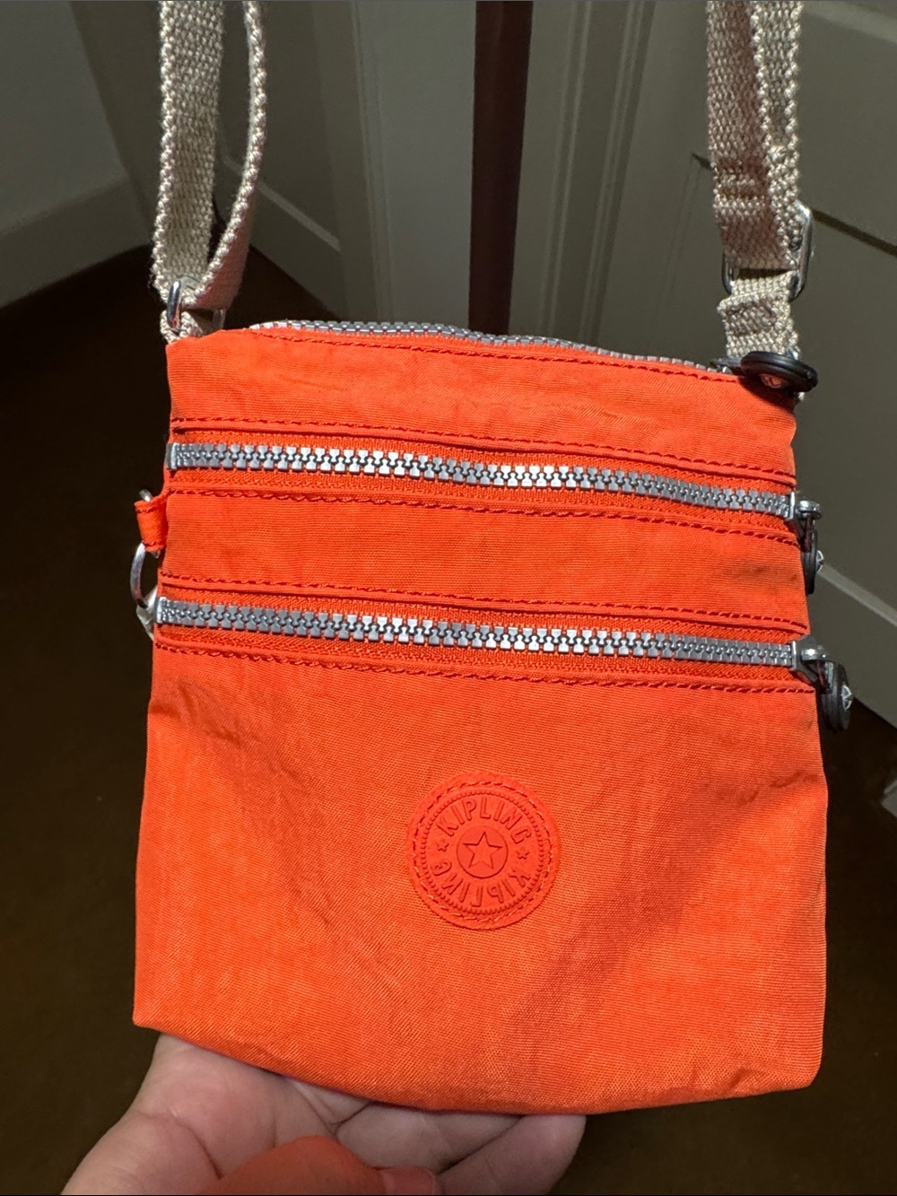 Kipling Bright Orange Compact Crossbody